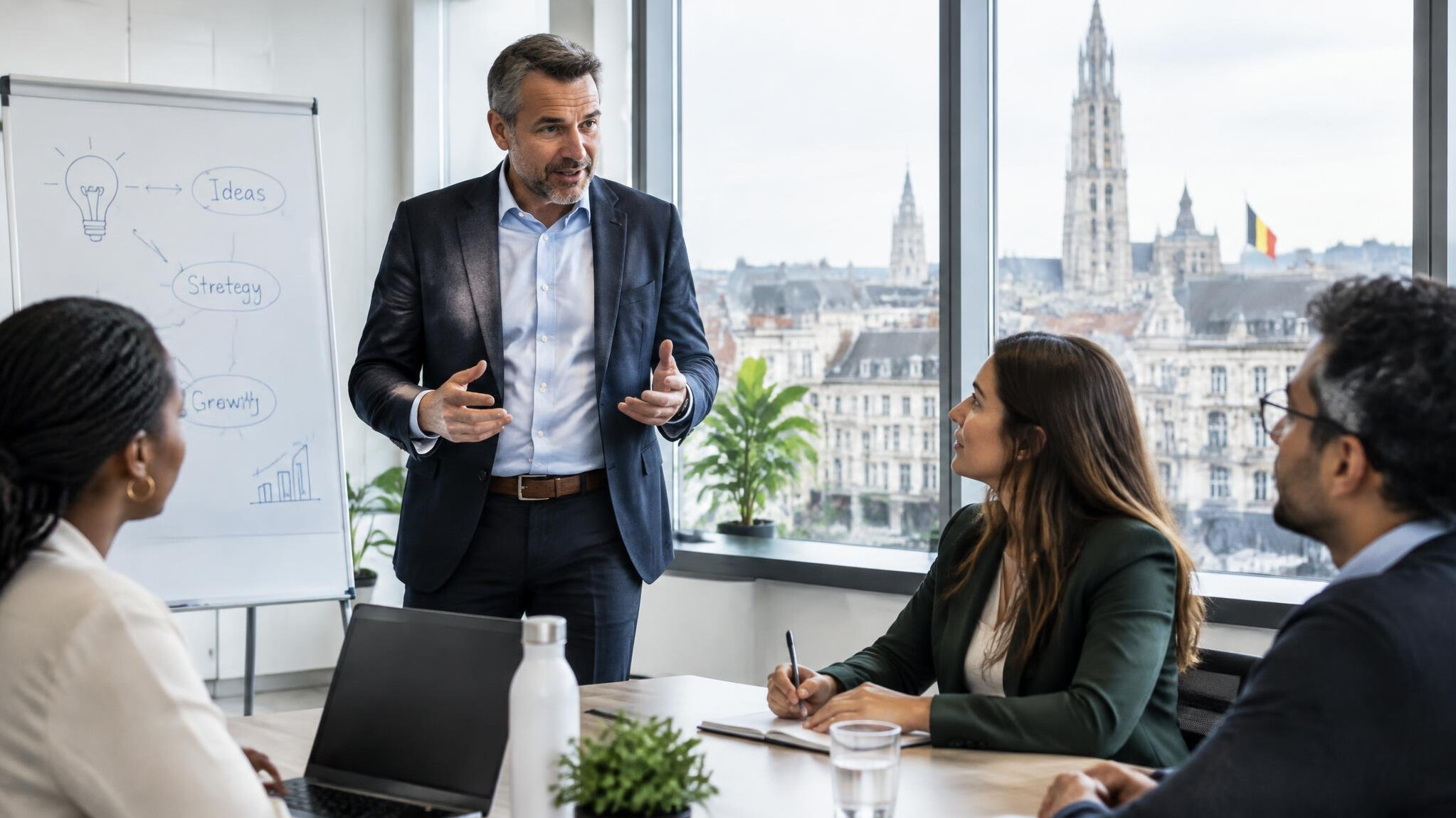 Business leader speaking to a team during a meeting