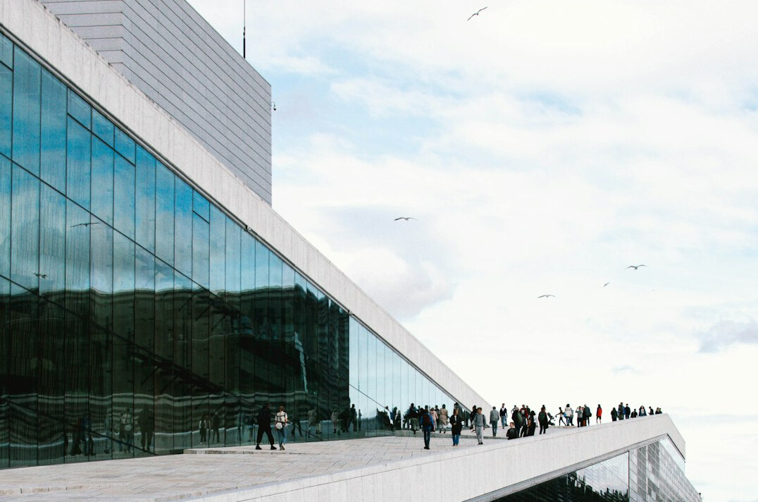 Modern glass office building exterior in a European city